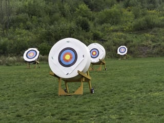 Four movable targets at back of archery range.jpeg